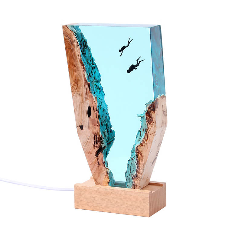 Décorations de bureau représentant un plongeur de baleines dans les cavernes