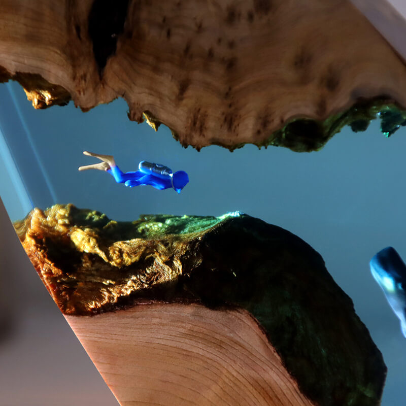 Décorations de bureau représentant un plongeur de baleines dans les cavernes