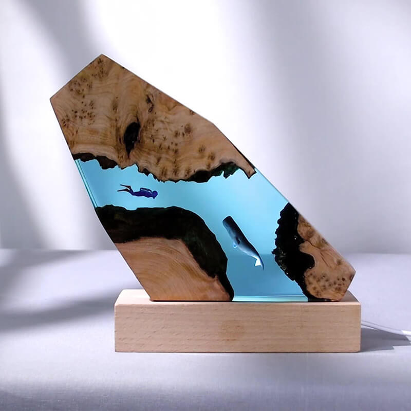 Décorations de bureau représentant un plongeur de baleines dans les cavernes