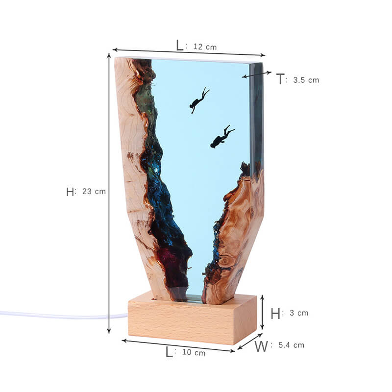 Décorations de bureau représentant un plongeur de baleines dans les cavernes