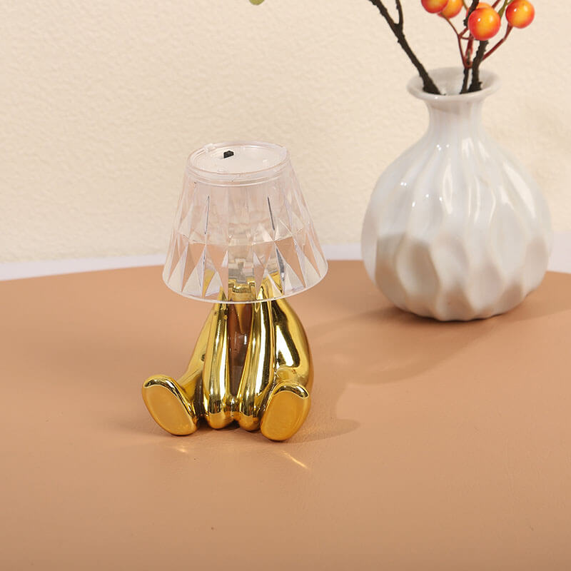 Lampe de table créative en forme de statuette