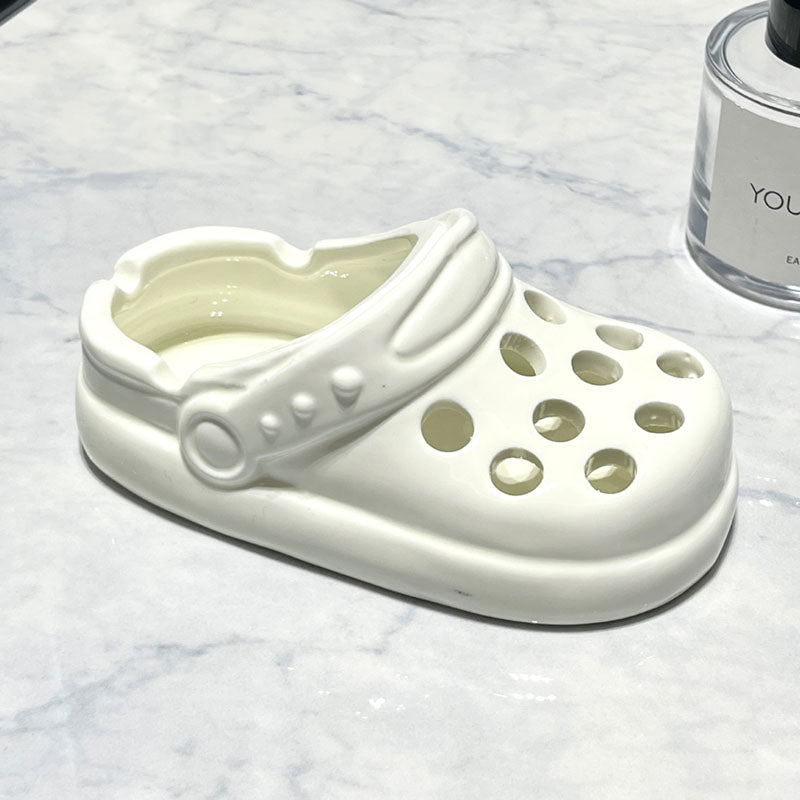 Cendrier à chaussures avec trou mignon