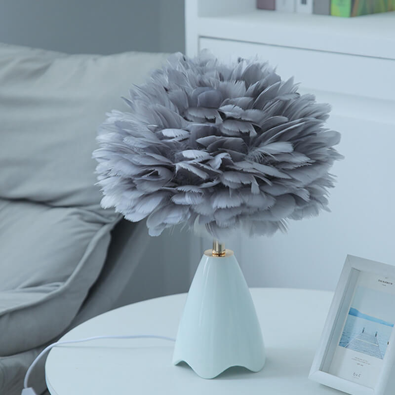 Lampe de table en verre à plumes