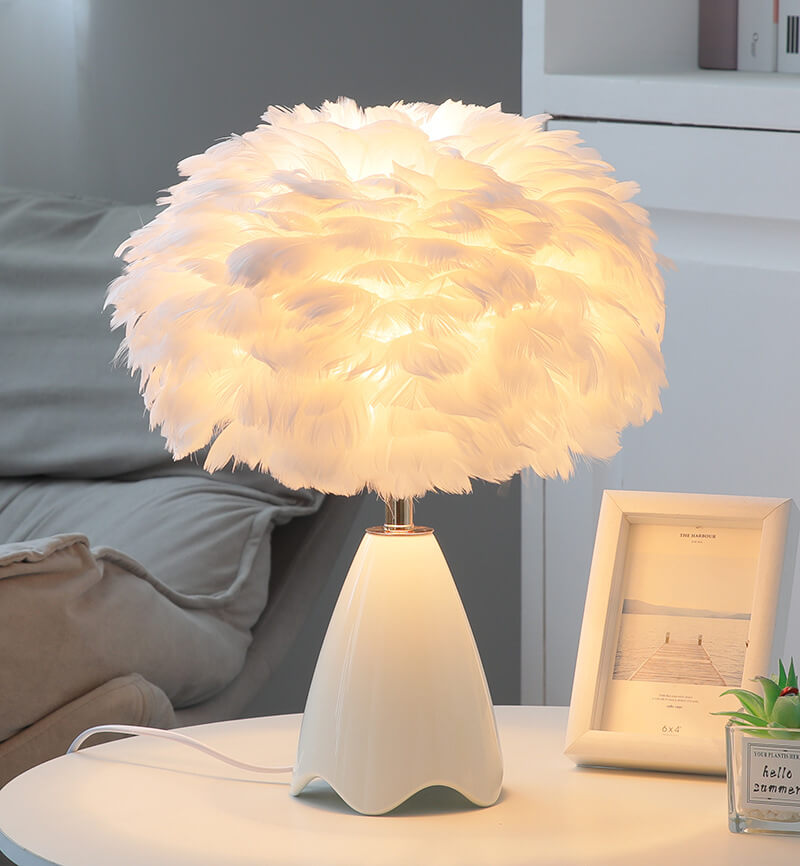 Lampe de table en verre à plumes