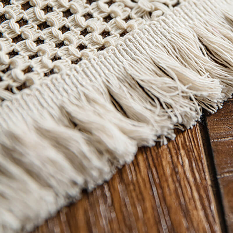 Chemin de table en jute tissé à pompons creux
