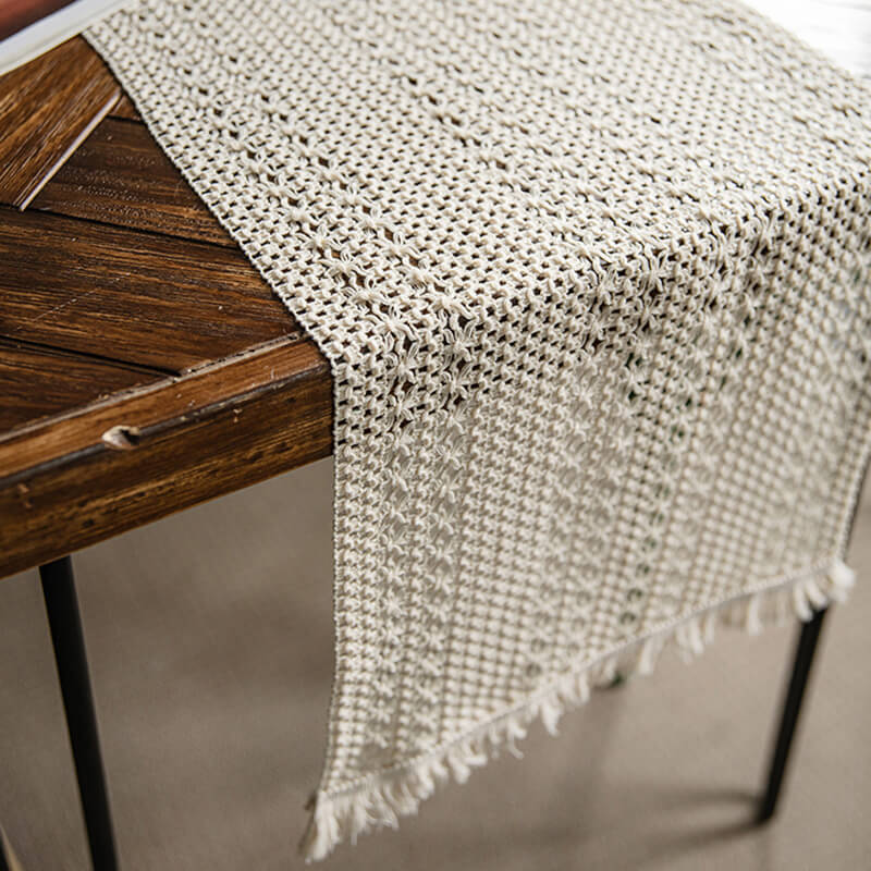 Chemin de table en jute tissé à pompons creux