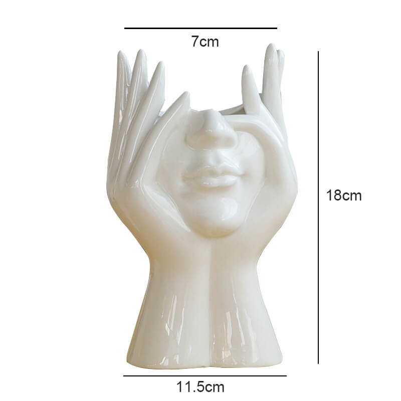 Vases en céramique représentant des portraits d'art