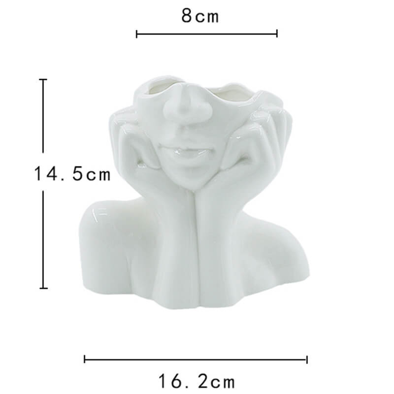 Vases en céramique représentant des portraits d'art